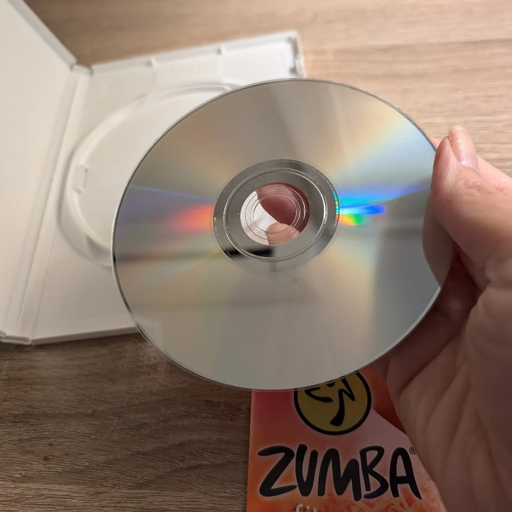 Nintendo Wii Zumba Fitness game with booklet